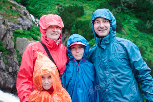 Preview: Family trip in mountains on rainy day. Poor weather. Summer vacation. Outdoor activities. Hiking