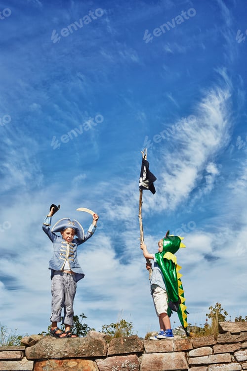 Preview: Two children on an adventure, wielding makeshift swords and flags under a vast blue sky.