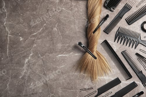 Preview: Flat lay composition with hair salon tools on grey background. Space for text