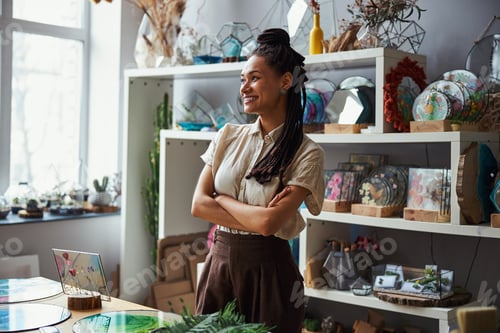 Preview: Merry floral decorator gazing into the distance