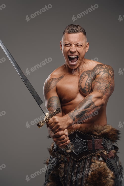 Preview: Violent warrior with tattoos holding sword against gray background