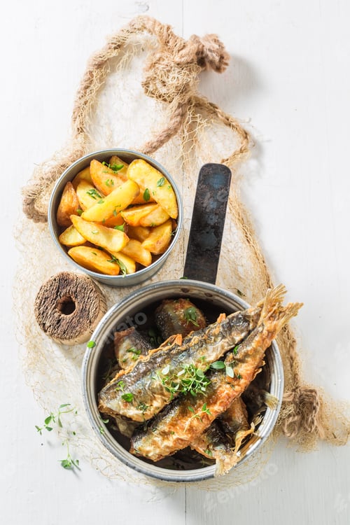 Preview: Delicious roasted herring fish with salt and herbs