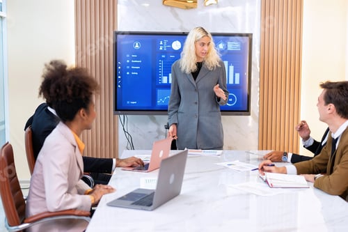 Preview: Employee on job corporate Business colleagues around the table look presentation from large screen