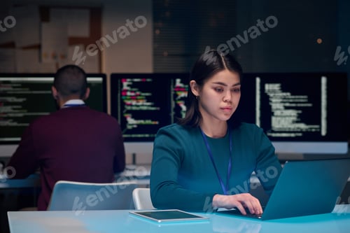 Preview: Girl Software Developer using Laptop