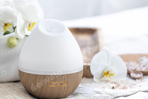 Preview: Modern oil aroma diffuser close up on a blurred background.