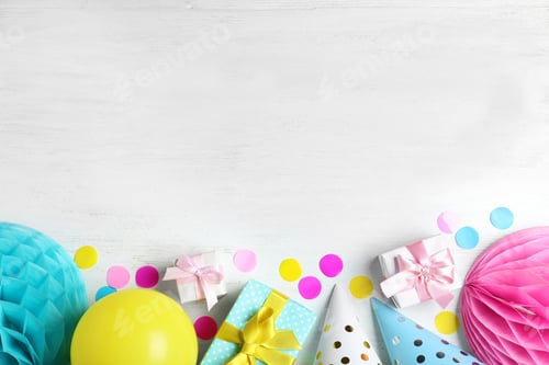 Preview: Colorful birthday accessories on white wooden background, flat lay. Space for text