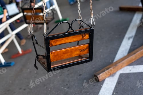 Preview: Wooden swing at a fair