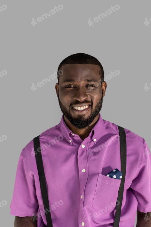 Preview: portrait of handsome smiling african american man in stylish clothing isolated on grey