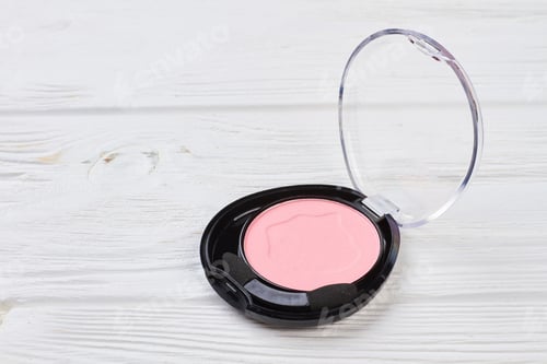Preview: Pink color eyeshadow in plastic container.