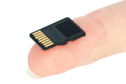 Preview: Tiny flash memory card on fingertip