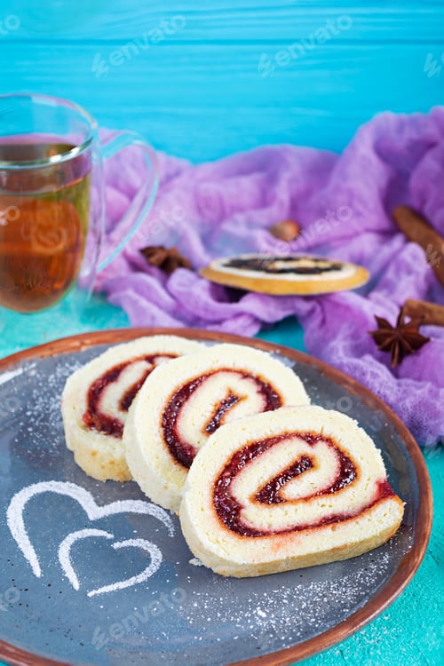 Preview: Swiss roll with strawberry jam. Jelly roll with decoration