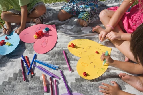 Preview: Children making paper hearts