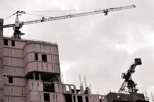 Preview: Working tall cranes inside place for with tall buildings under construction