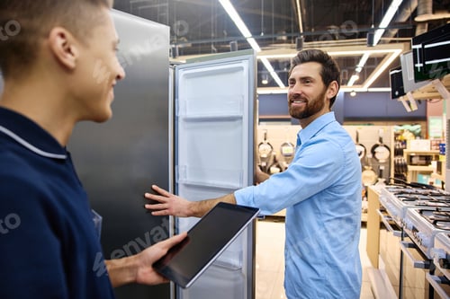 Preview: A Customer Engaging in a Conversation with a Salesperson at an Appliance Retail Store