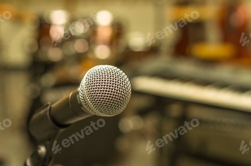 Preview: Close up of microphone on musician blurred background