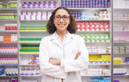 Preview: Pharmacy, medical shelf stock and portrait of a woman pharmacist ready for work. Pharmaceutical sto