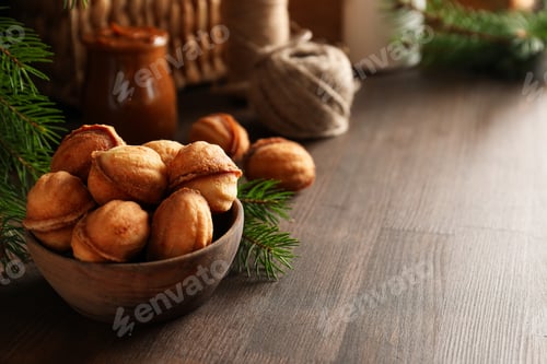 Preview: Cookies Nuts in a bowl with a sprig of needles