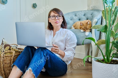 Preview: Woman Working from Home with her Cat
