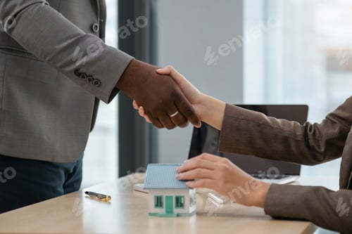 Preview: Real estate diverse ethnicity agent shakes hands with customer after finished contract after about