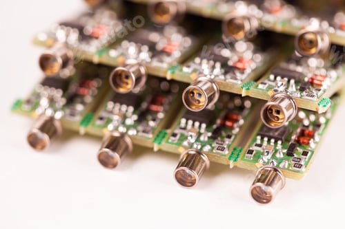 Preview: Close-up of four small microcircuits PCB