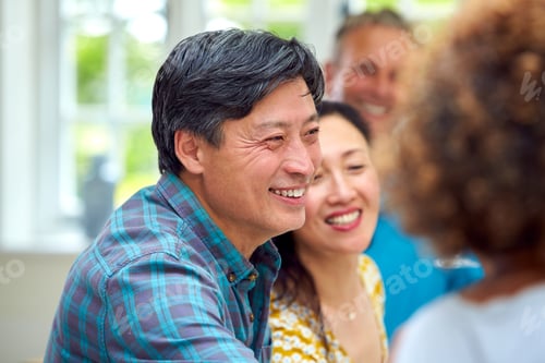 Preview: Group Of Multi-Cultural Senior Friends On Summer Vacation Meeting For Drinks In Holiday Apartment
