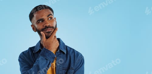 Preview: Man, thinking and planning idea with choice and decision in studio on blue background and questions