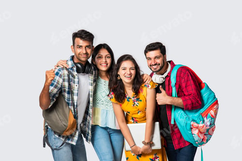 Preview: Asian Indian smart college students posing for a photo against white background