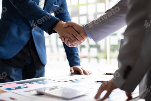 Preview: Business partner handshake after the meeting. Financial and investment cooperation.