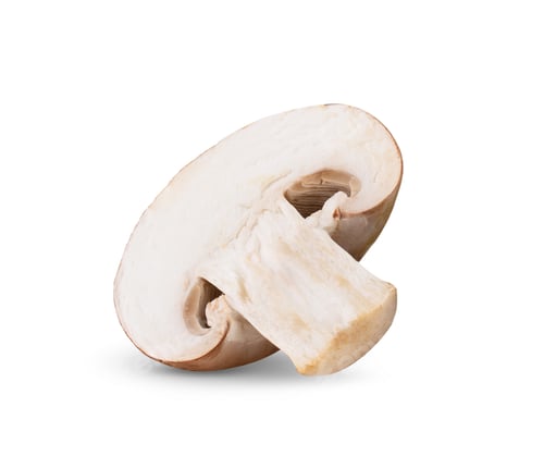 Preview: Fresh champignon mushrooms isolated on white