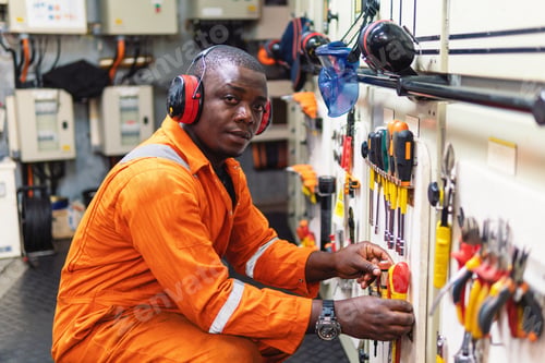 Preview: Marine engineer officer working in engine room