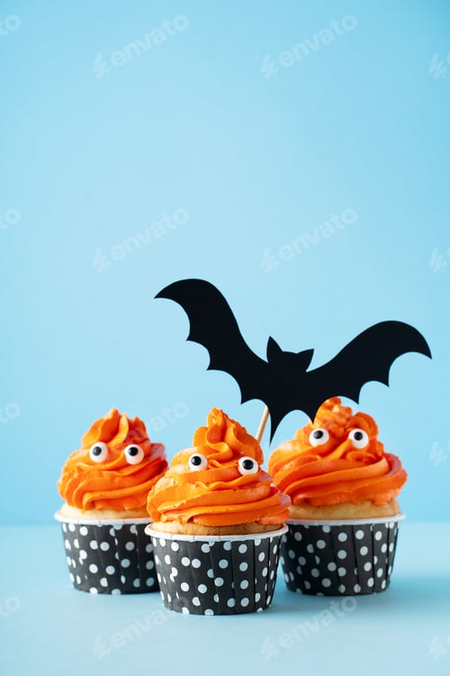 Preview: Monster orange funny cupcakes with eyes, halloween