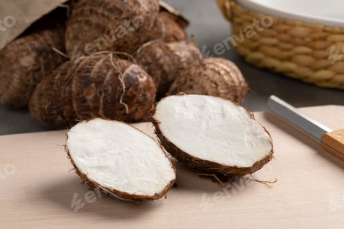 Preview: Fresh whole and halved taro vegetable