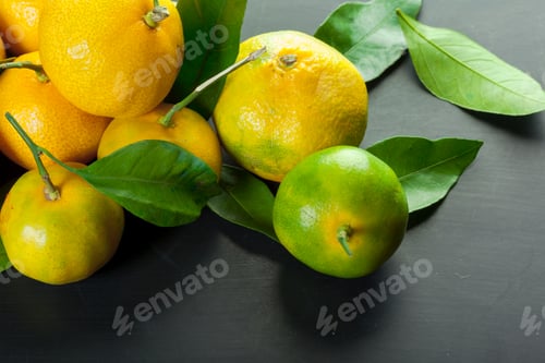 Preview: Mandarins on a black background