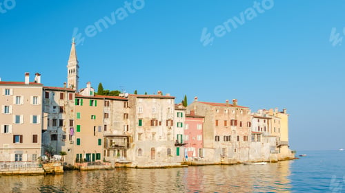 Preview: Charming waterfront buildings of Rovinj Croatia basking in the warm afternoon sunlight