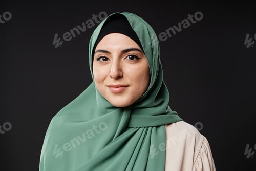 Preview: Muslim Woman Wearing Hijab and Smiling at Camera with Confidence