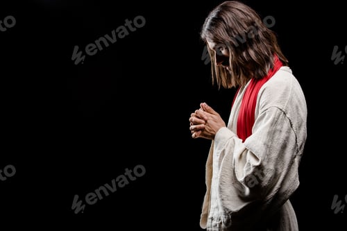 Preview: bearded man praying with clenched hands isolated on grey