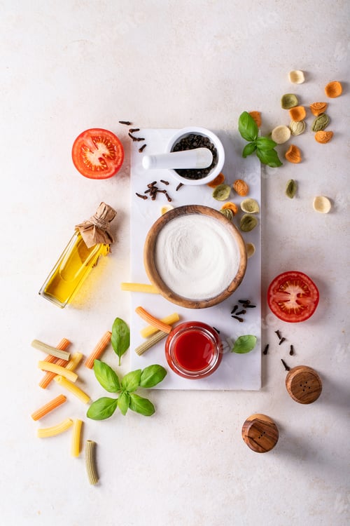 Preview: Raw ingredients for cooking Italian penne pasta