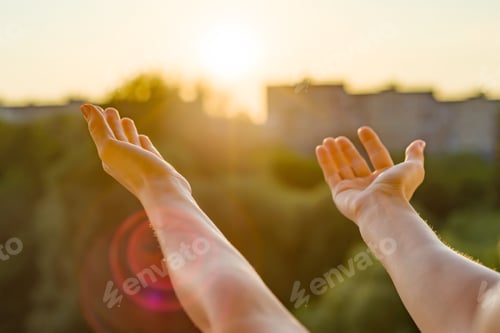 Preview: Hands open to the sunset