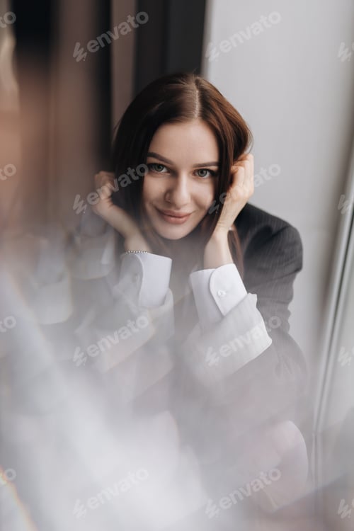 Preview: A Charming Portrait of a Stylish Woman in Elegant Business Attire, Capturing Her Essence