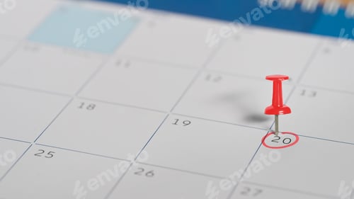 Preview: Red push pin marking the 20th as an important date, symbolizing an appointment or deadline