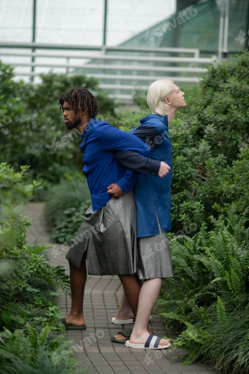 Preview: Male models with different nationality posing in greenhouse