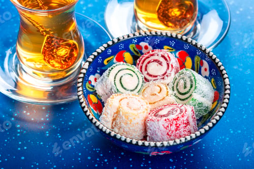 Preview: various pieces of turkish delight lokum and black tea