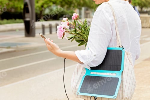 Preview: Solar battery charger for mobile devices. Sustainable lifistyle idea