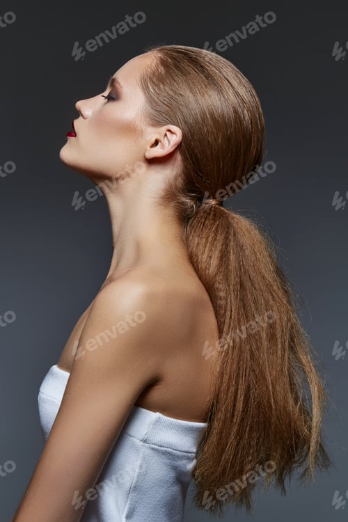 Preview: Woman Profile with Sleek Hair and Red Lipstick