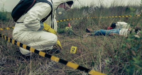 Preview: Woman with protection equipment examining evidence