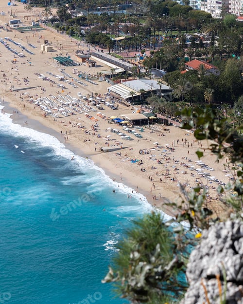 Preview: wonderful view from above on the beach where people relax