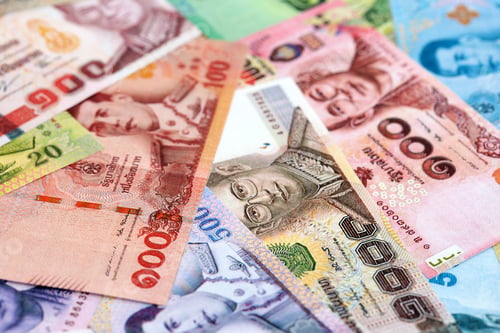 Preview: Thai baht currency money. The current banknotes lies on table in big amount