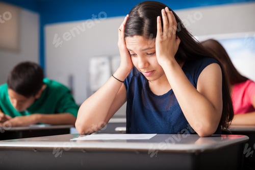 Preview: Worried teen taking a test