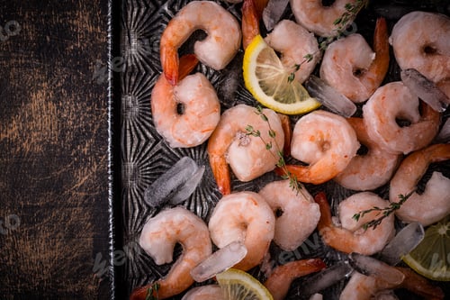 Preview: Frozen uncooked prawns or shrimps with lemon