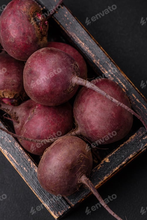 Preview: Fresh raw beetroot in the form of tubers on a textured concrete background
